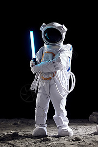 任务站站在月球表面上手持探照设备的宇航员背景