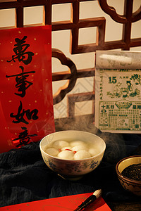 春节台历复古风冒着热气的芝麻汤圆背景
