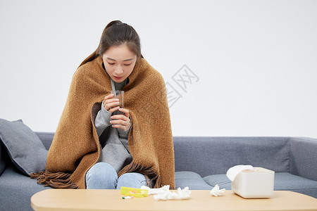 寒冬预防感冒一个人在家生病的女性背景