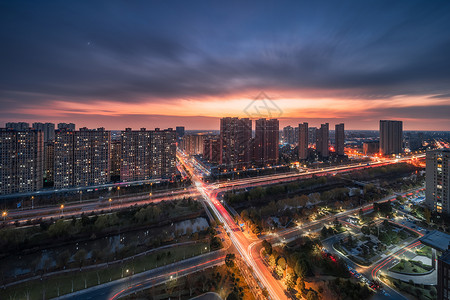 夜晚城市延时摄影风景背景图片