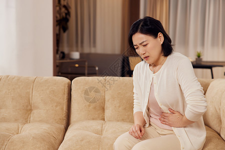 中年妇女素材中年妇女肚子疼痛背景