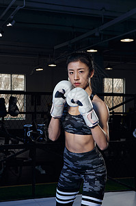 女性拳击运动员形象背景图片