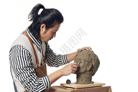 男青年雕刻泥塑作品图片