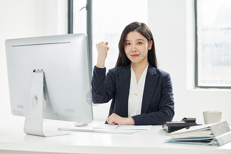 职业商务女性加油手势背景图片