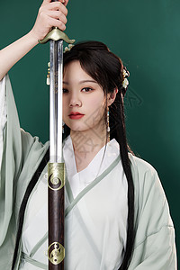 女武士中国风汉服美女舞剑形象背景
