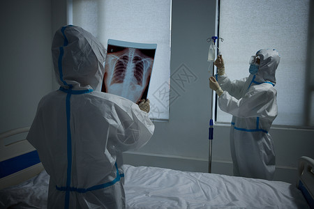 疫情防控片病房里手拿x光片的医护人员背景