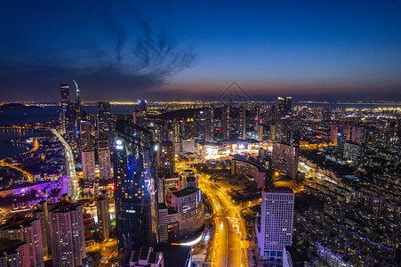 青岛城市夜景夜晚的都市背景图片