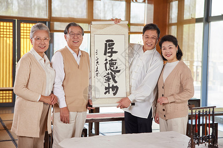 中国元素手写展示书法的老年人背景