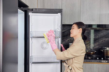 专业消毒打扫厨房清洁的家政女性背景