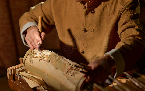 竹雕工艺品制作背景图片