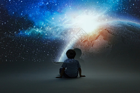 星河科技坐在地上的小男孩体验宇宙星河背景