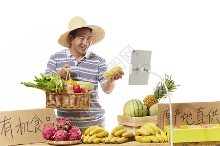淳朴的菜农直播售卖水果蔬菜背景图片