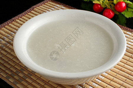 烹调盘子中式白米粥背景