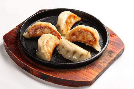 日式煎饺油酥饺子高清图片