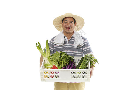 中年男性抱着一筐水果蔬菜高清图片