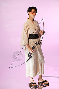 日系少年日系和风少年手拿弓箭背景