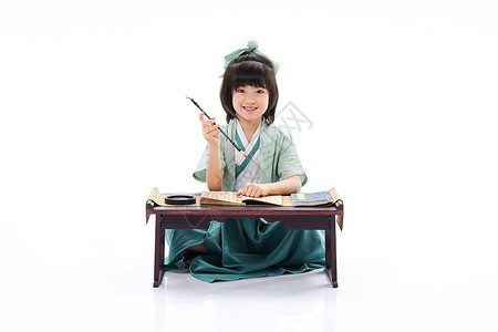 绿色军装毛笔字小女孩课堂上学习书法毛笔字背景