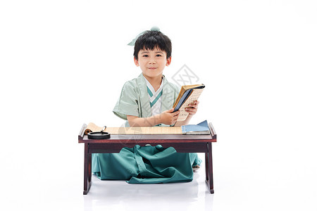 国学书籍素材阅读国学书籍的小男孩背景