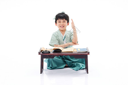 私塾课堂上学习国学的小男孩背景图片