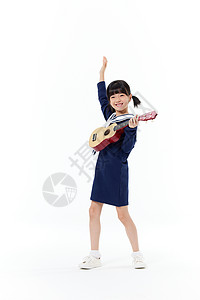 吉他培兴趣班手拿尤克里里开心的小女孩背景