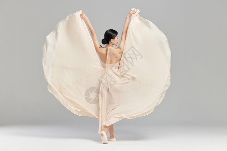 女性舞者柔美背影背景图片