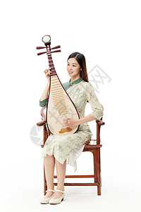 优雅的旗袍青年女子弹奏琵琶图片