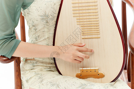 古风素材女子弹奏琵琶的女子特写背景