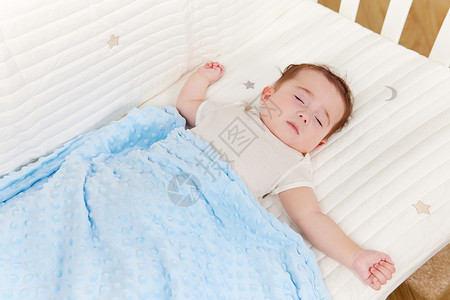 宝宝卧室睡着的可爱婴儿背景