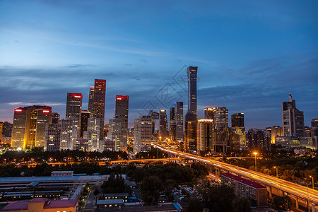 黄昏时的北京国贸CBD城市景观背景图片