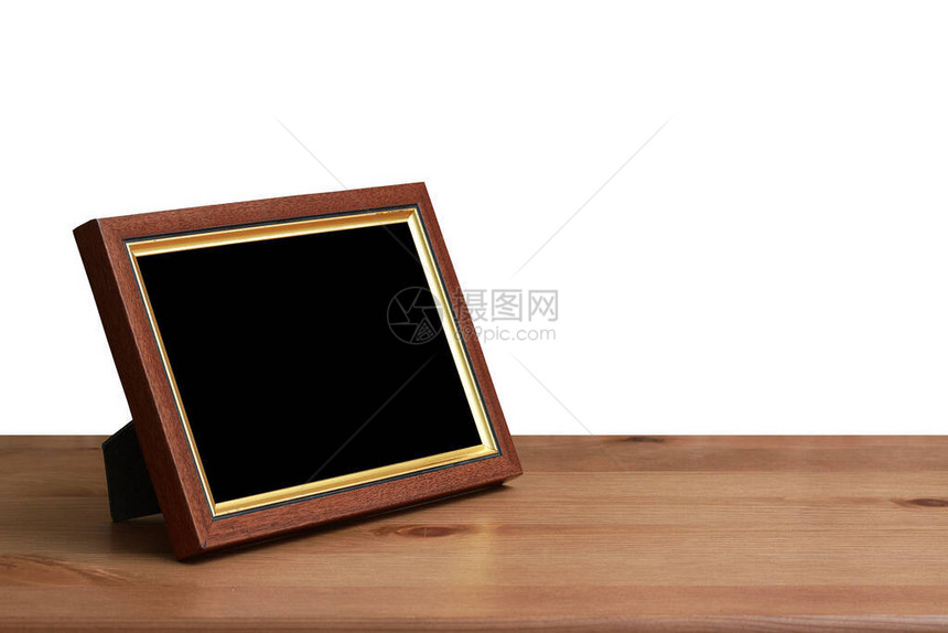 桌子上的照片框白色的背黑锅与图片