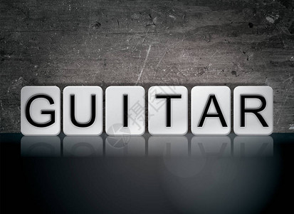 吉他概念和主题这个词用白色瓷砖写背景图片