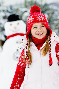 冬天雪人可爱的女孩在图片