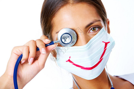 搞笑护士素材蒙着面罩的助理肖像上面带着笑背景