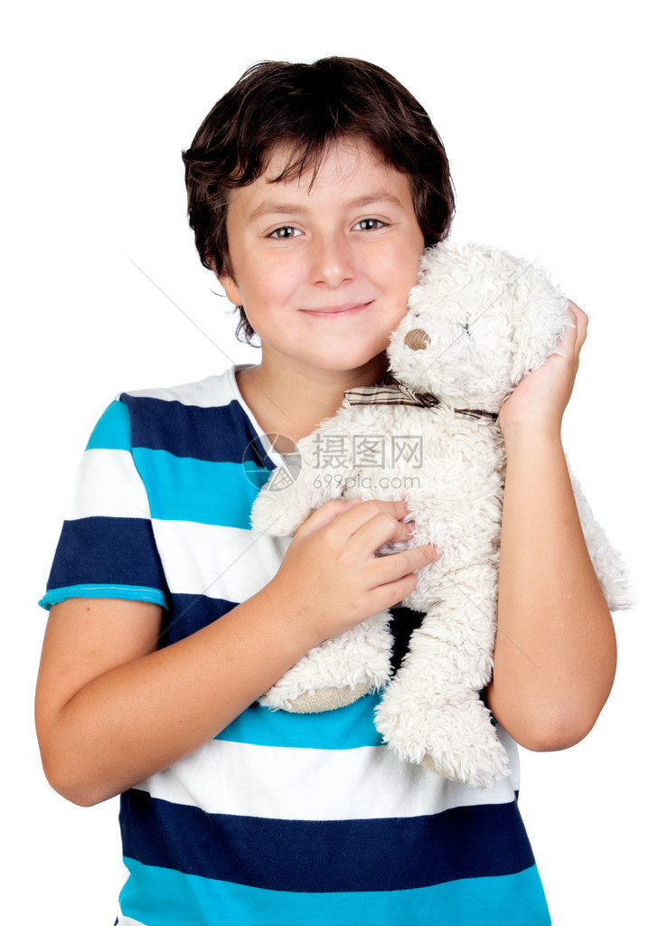 可爱的男孩拥抱他的泰迪熊孤图片