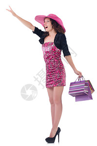 女孩在白衣粉红裙子和巴拿马餐服的纸袋上畅销精美购背景图片
