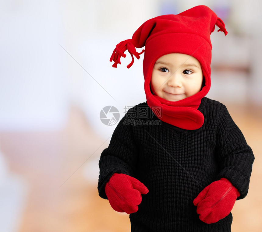 抽象背景的婴儿男孩穿着温暖图片
