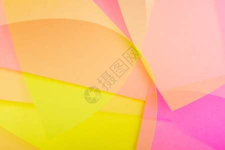 摘要颜色纸背景由彩色纸组成的曲线形图片