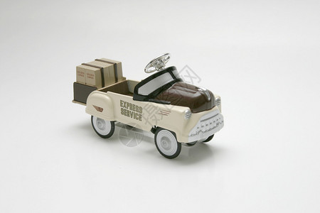 复古风格的玩具包装交付踏板车的图像图片