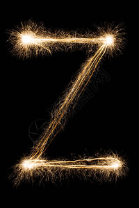 英文大字母Z由黑色背景上的燃烧火花制成闪亮的节日派对烟花字体图片