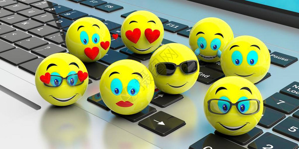 笔记本电脑上的一组黄色表情符号3d插图图片