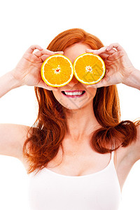 年轻开朗的女人手里拿着橘子图片