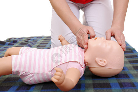 婴儿假人急救示范系列急救教练展示如何在进行口对复苏之前图片