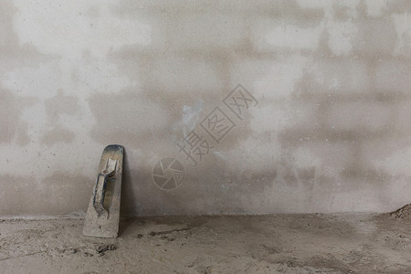 建筑工地水泥墙用粗土手持工具使用散图片