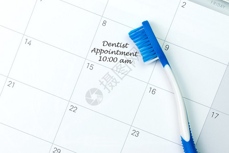 牙医任命时提醒日历上的蓝色牙刷图片