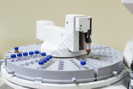 气相色谱仪化学实验室在自动扫描器托盘中背景