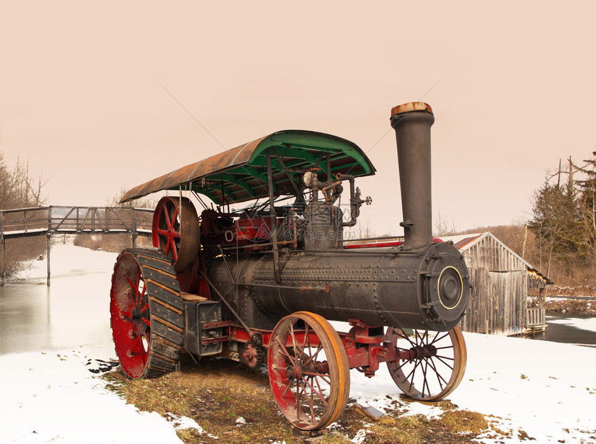 伊利运河岸边的旧蒸汽机冬季图片