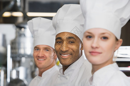 微笑的厨师团队背景图片