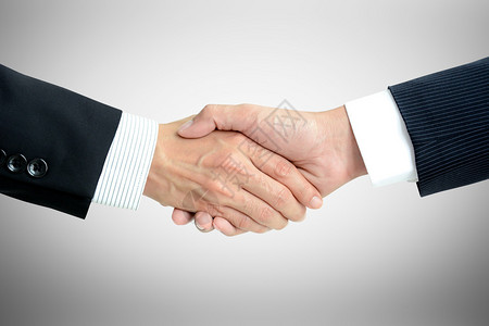 与商人握手成功交易问候和商背景图片
