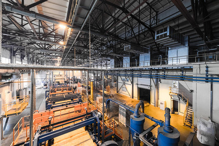 现代工厂生产玻璃纤维重工业机械金属加工车间概念的顶尖视野背景图片