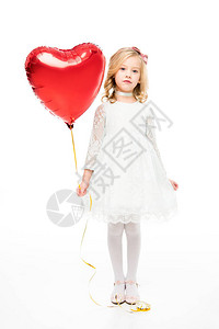 有心形气球的可爱小女孩看着在白色上图片